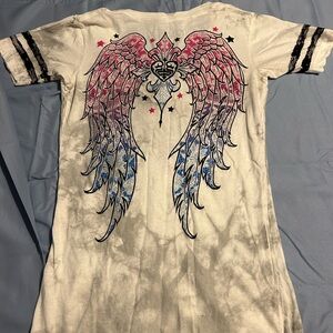 Buckle Tahirt-never worn! New but no tags!
Sparkle!